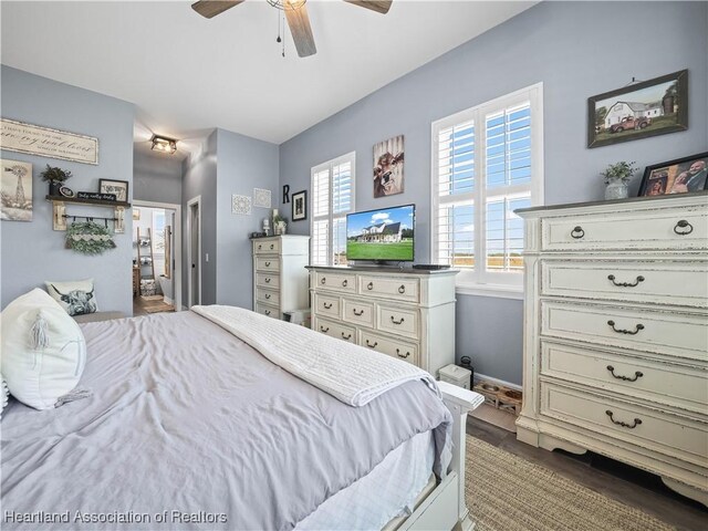 bedroom featuring ceiling fan and hardwood / wood-style flooring