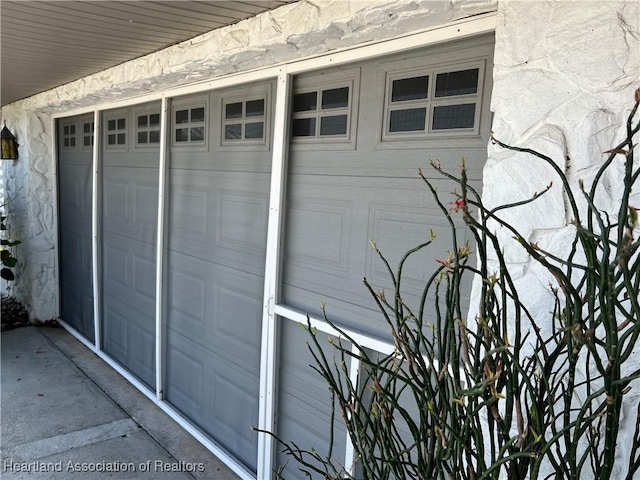 entrance to property featuring a garage