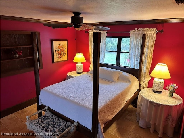 bedroom with ceiling fan, tile patterned flooring, and ornamental molding