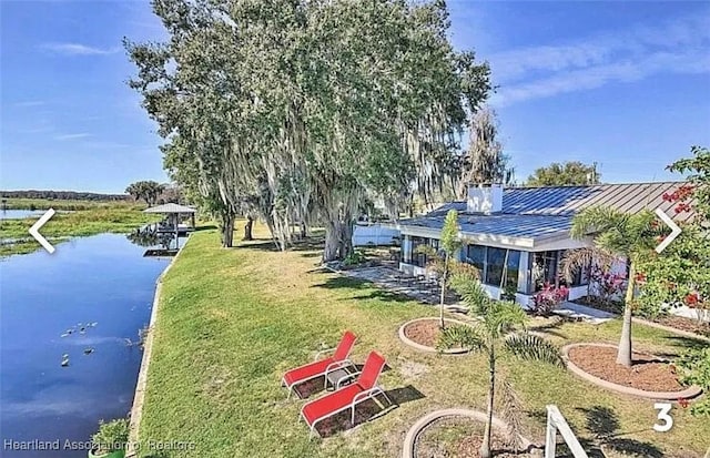 exterior space with a water view