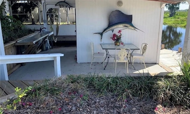 view of patio / terrace featuring a water view