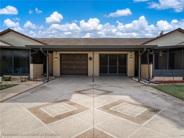 170 Parkview Cir, Lake Placid, FL 33852 - ranch-style home with brick siding, driveway, a garage, and a shingled roof