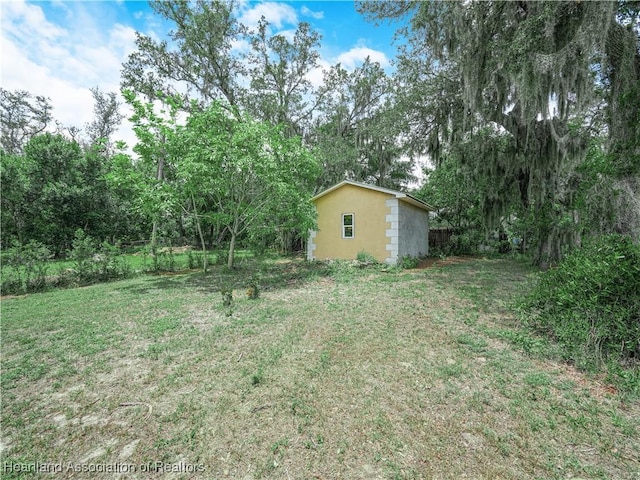 1621 Warfield Pl, Sebring, FL 33870 - view of grassy yard with an outbuilding