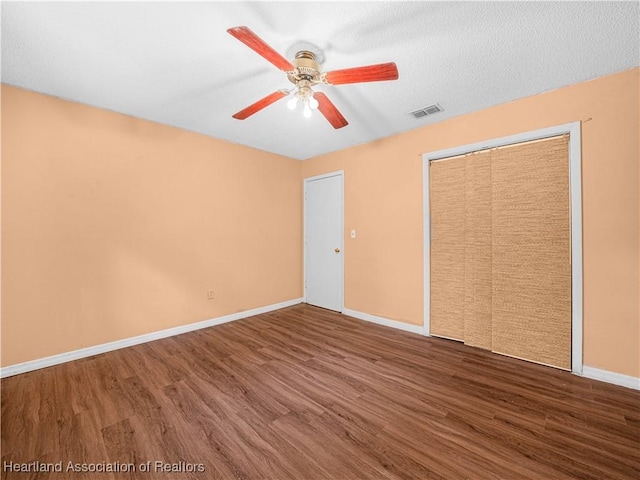 1621 Warfield Pl, Sebring, FL 33870 - unfurnished bedroom with wood finished floors and a ceiling fan