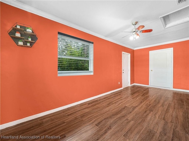 1621 Warfield Pl, Sebring, FL 33870 - unfurnished room featuring wood finished floors, crown molding, a ceiling fan, and attic access