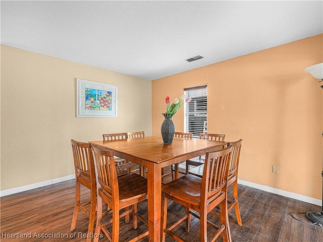 1621 Warfield Pl, Sebring, FL 33870 - dining room featuring dark wood finished floors