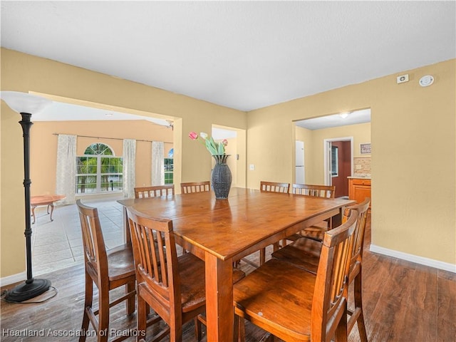 1621 Warfield Pl, Sebring, FL 33870 - dining room featuring wood finished floors and baseboards
