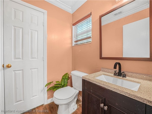 1621 Warfield Pl, Sebring, FL 33870 - half bathroom featuring vanity, ornamental molding, and wood finished floors