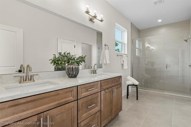 4954 San Ignacio Dr, Sebring, FL 33872 - full bathroom featuring double vanity, tile patterned flooring, and a shower stall