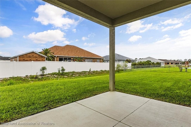 4954 San Ignacio Dr, Sebring, FL 33872 - fenced backyard with a patio area