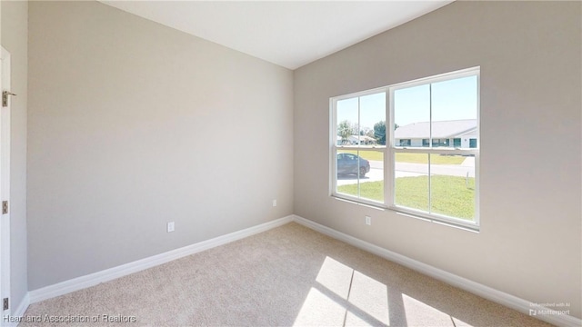 3900 Monza Dr, Sebring, FL 33872 - empty room featuring carpet and baseboards