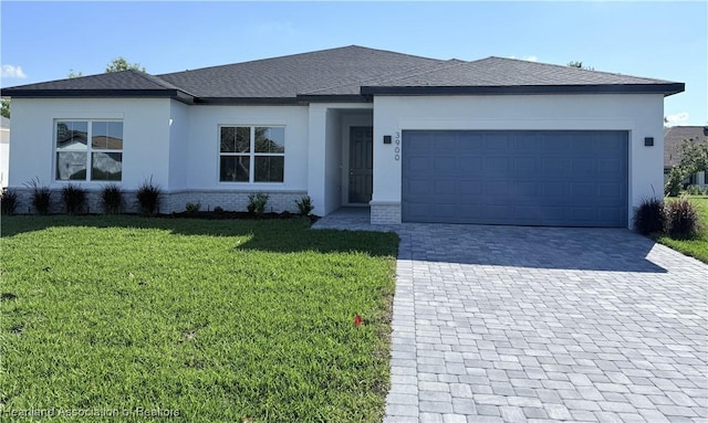 3900 Monza Dr, Sebring, FL 33872 - view of front facade with decorative driveway, an attached garage, stucco siding, cooling unit, and a yard
