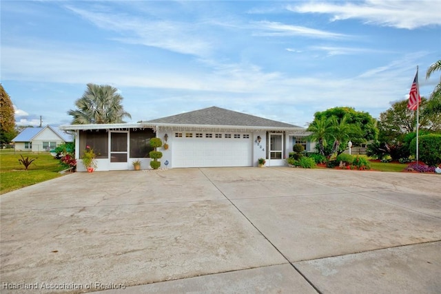 single story home with a garage