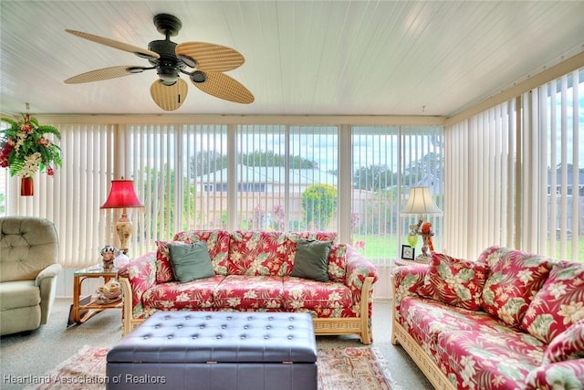 sunroom with ceiling fan