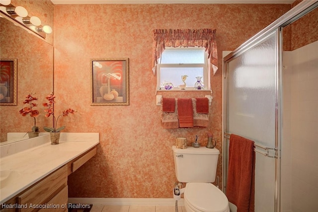 bathroom featuring tile patterned floors, walk in shower, vanity, and toilet