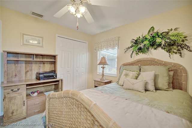 bedroom featuring ceiling fan and a closet