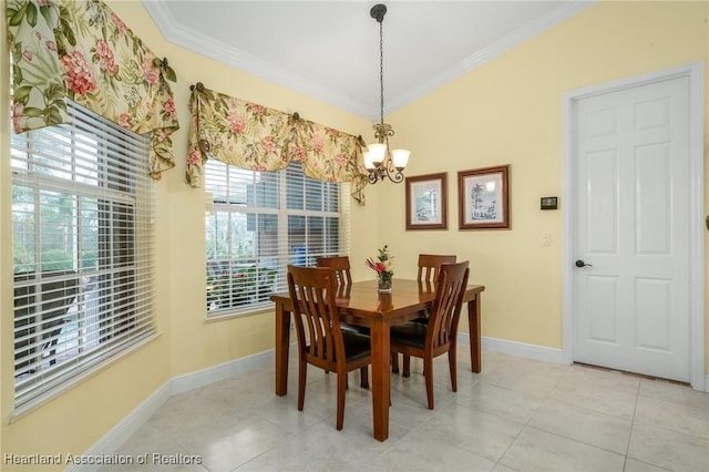 tiled dining space with a notable chandelier and crown molding