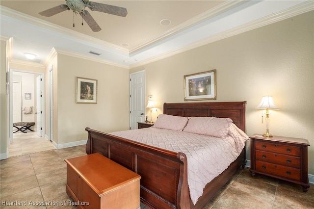 tiled bedroom featuring crown molding, ceiling fan, and a raised ceiling