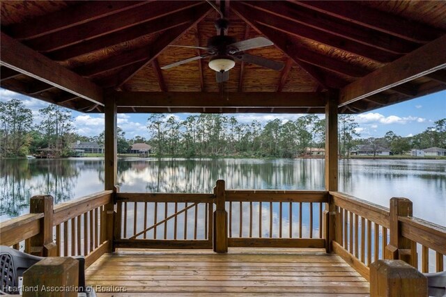 dock area with a water view and a gazebo