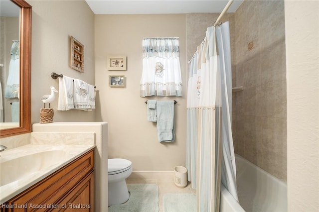 full bathroom with shower / bath combination with curtain, tile patterned floors, vanity, and toilet