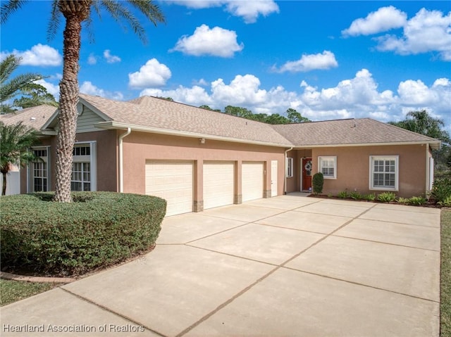 single story home with a garage