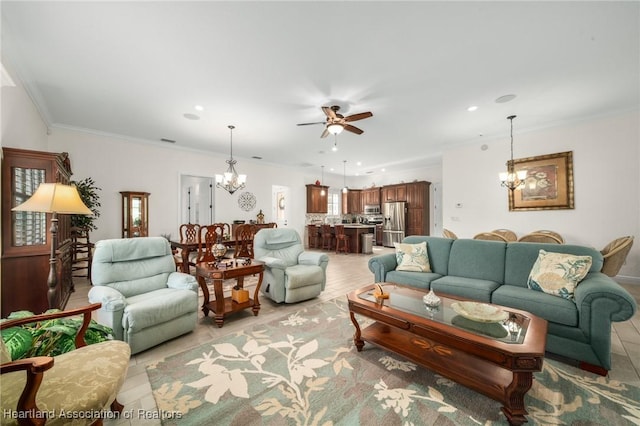 living room with ornamental molding and ceiling fan with notable chandelier