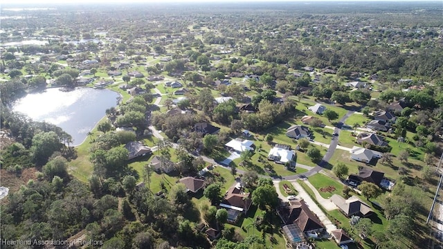 birds eye view of property featuring a residential view and a water view