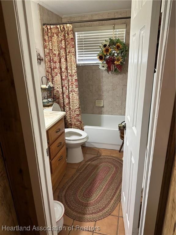 5382 E Felber Rd, Avon Park, FL 33825 - full bathroom with toilet, tile patterned floors, vanity, and shower / tub combo with curtain