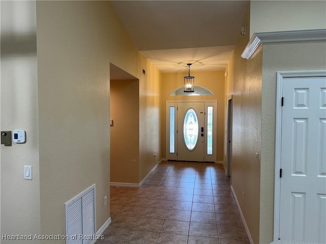 entryway featuring tile patterned flooring