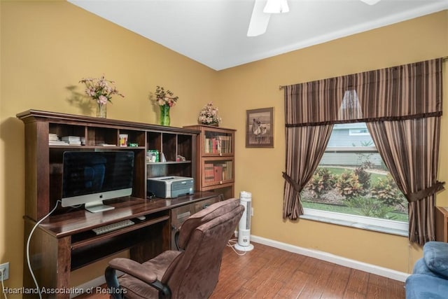 office with hardwood / wood-style flooring and ceiling fan