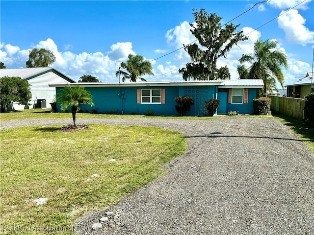 ranch-style house with a front yard