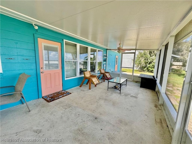 unfurnished sunroom with plenty of natural light