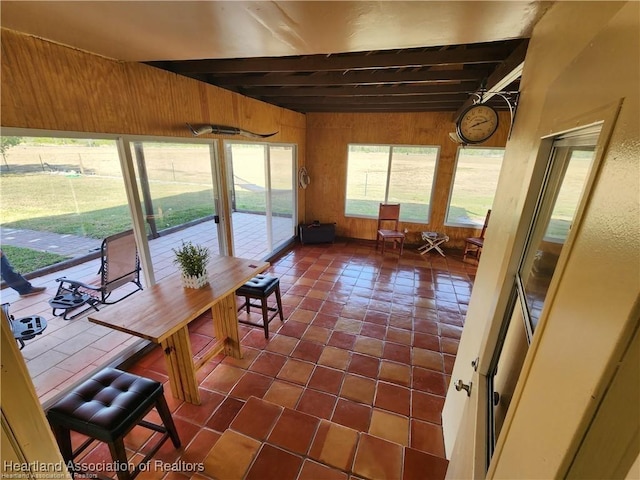 sunroom / solarium with beam ceiling