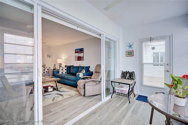 living area with light wood-style floors and a wealth of natural light