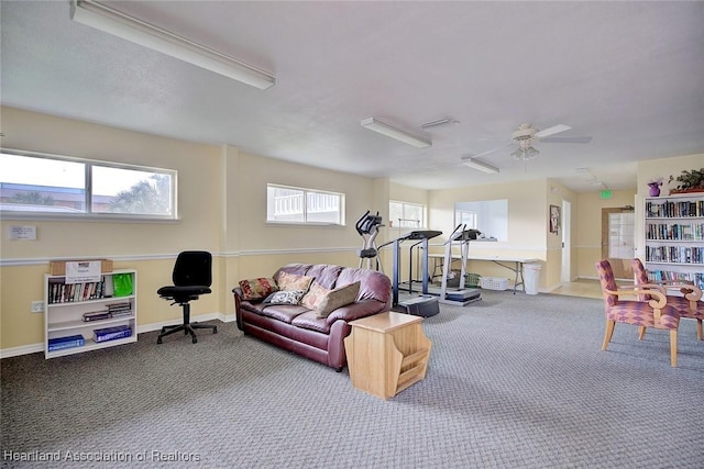 interior space with plenty of natural light, carpet, and baseboards