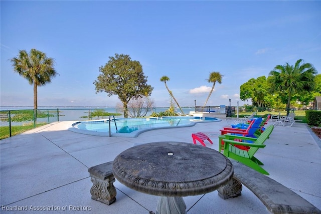 pool with a patio