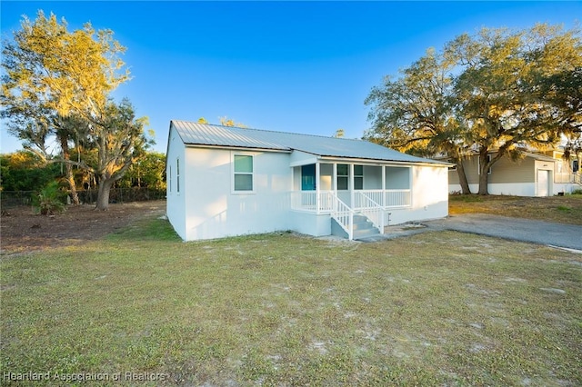 view of front of home with a front yard