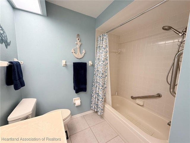 bathroom with toilet, shower / tub combo, baseboards, and tile patterned floors