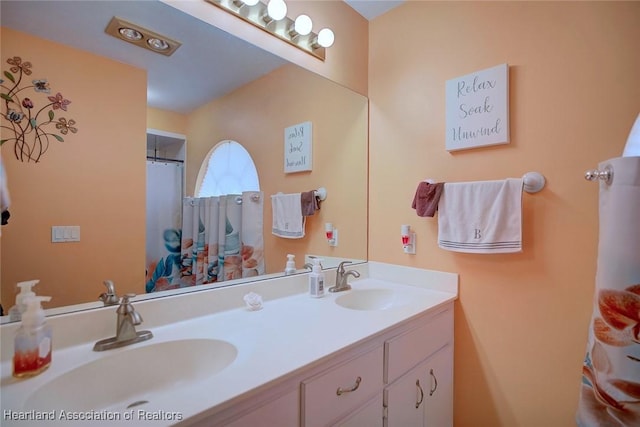 bathroom featuring vanity