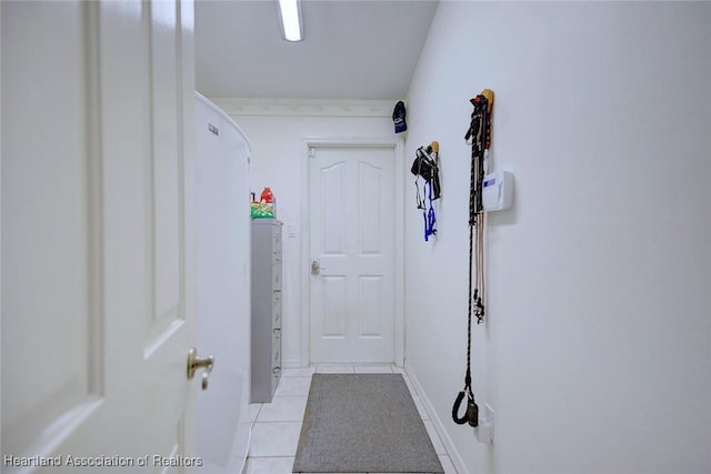 hallway with light tile patterned flooring