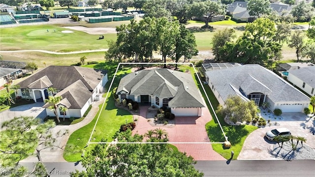 birds eye view of property featuring a residential view and golf course view