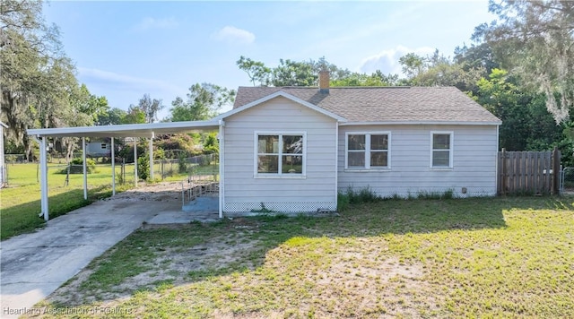 1108 Edgemoor Ave, Sebring, FL 33870 - view of property exterior featuring concrete driveway, a chimney, a carport, and a shingled roof