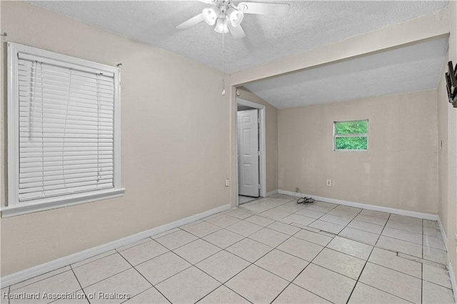 1108 Edgemoor Ave, Sebring, FL 33870 - unfurnished room with a textured ceiling, light tile patterned floors, ceiling fan, and lofted ceiling