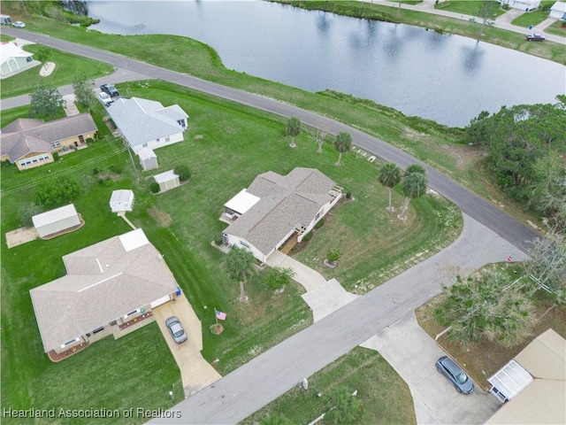 aerial view with a residential view and a water view