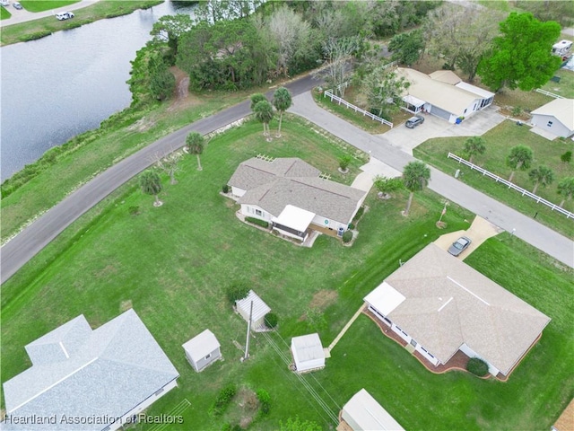 drone / aerial view featuring a water view