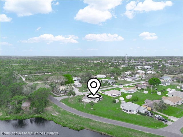 aerial view featuring a water view and a residential view