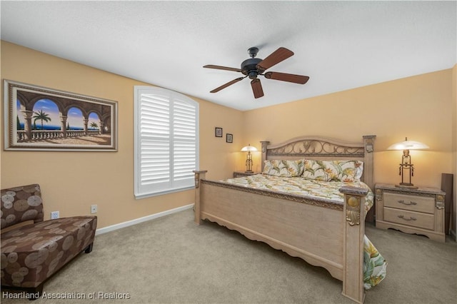 bedroom with light colored carpet and ceiling fan