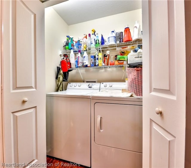 washroom featuring washer and clothes dryer