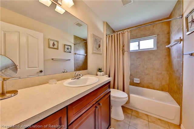 full bathroom with toilet, shower / tub combo, vanity, and tile patterned floors