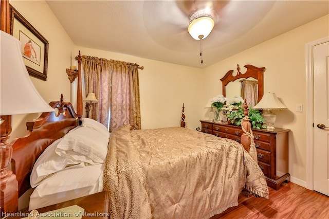 bedroom featuring ceiling fan and wood-type flooring